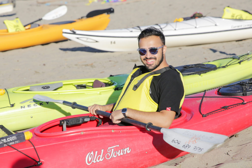 Our culture makes waves! Rahul N is in a red kayak on our annual summer event