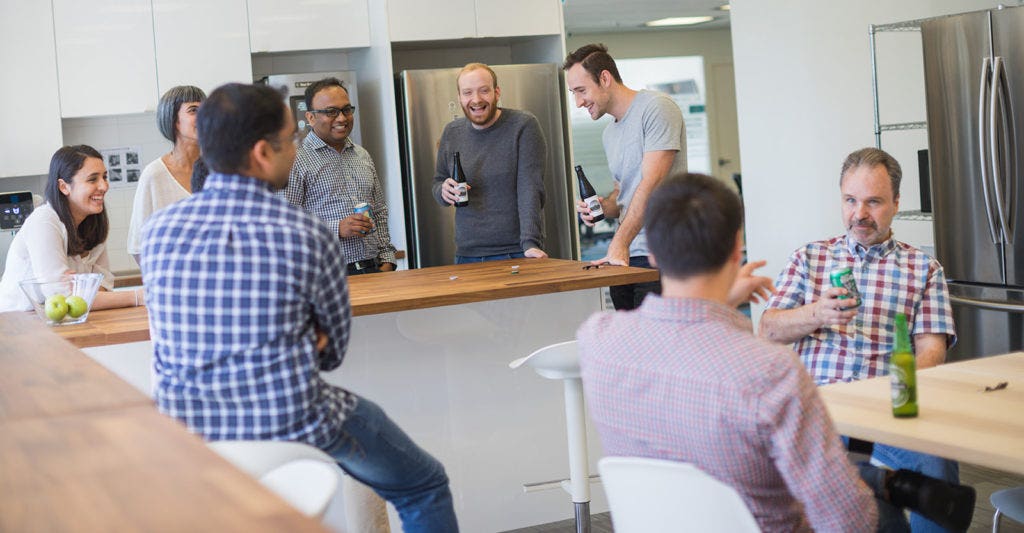 A inclusive group of Groundsweller's sit in the Vancouver office